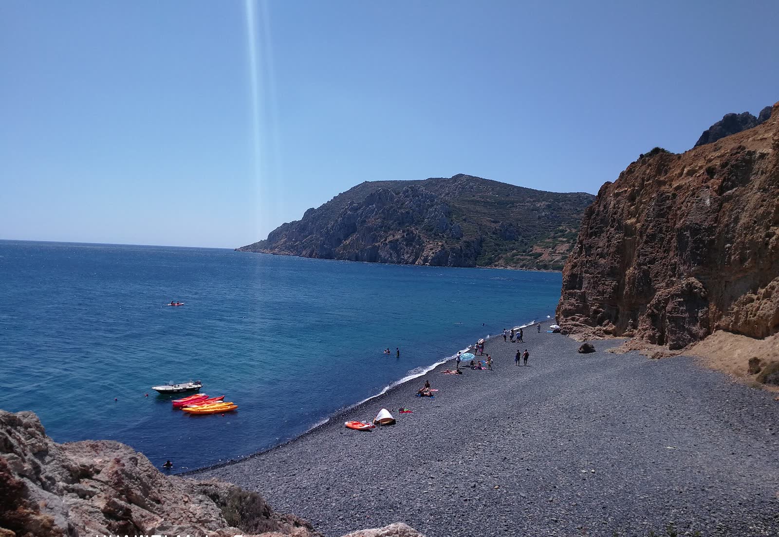 Mavra Volia beach with black volcanic pebbles, southern Chios
